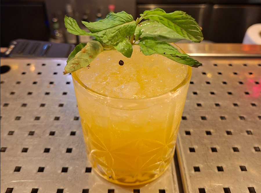 SUNSET BLAI cocktail with vodka, passion fruit and basil
